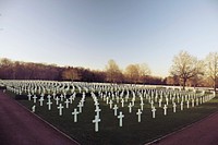 Wide angle shot of a war veteran cemetery filled with white crosses.. Original public domain image from <a href="https://commons.wikimedia.org/wiki/File:War_veteran_cemetery_(Unsplash).jpg" target="_blank" rel="noopener noreferrer nofollow">Wikimedia Commons</a>
