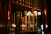 Book case of old books.. Original public domain image from Wikimedia Commons