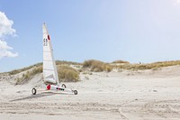 Land sailing yacht on a sand beach in St. Peter Ording. Original public domain image from Wikimedia Commons