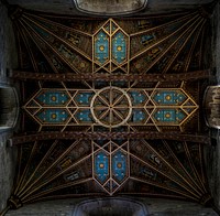 Blue and brown cross digital wallpaper. Original public domain image from <a href="https://commons.wikimedia.org/wiki/File:St_David%27s_Cathedral,_Saint_Davids,_United_Kingdom_(Unsplash).jpg" target="_blank">Wikimedia Commons</a>