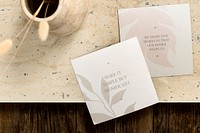 Square paper mockup, simple botanical design with marble table background psd