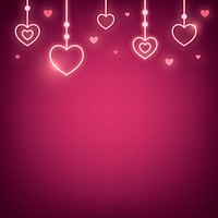 Neon light heart ornament on pink background