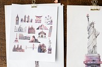 Architectural landmarks on white papers