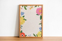 Floral frame mockup against a wall