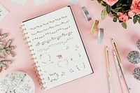 Doodle floral wreaths in a notebook paper