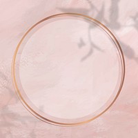 Round gold frame on shadowed pink paint background vector