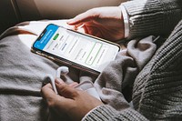 Woman getting a refund for a flight cancellation on a mobile phone mockup during the coronavirus pandemic