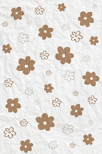 Gold flower pattern on crumpled paper textured background
