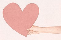 Hand holding heart psd for Valentine’s day hand drawn illustration