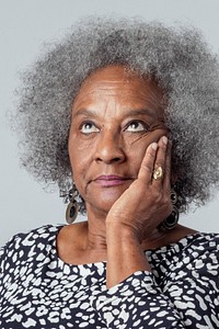 Black frustrated woman rolling her eyes 