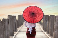 Free lady with Japanese umbrella on wood pier photo, public domain CC0 image.