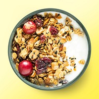 Yogurt bowl on yellow background, food photography, flat lay style