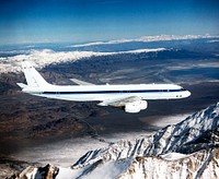 The DC-8 in flight near Lone Pine, Calif. In the foreground are the Sierra Nevada Mountains, covered with winter snow. In the distance are the White Mountains. Original from NASA . Digitally enhanced by rawpixel.