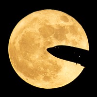 Aircraft taking off from Ronald Reagan National Airport is seen passing in front of the Moon as it rises in Washington, Sunday, Dec. 3rd, 2017. Original from NASA. Digitally enhanced by rawpixel.