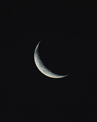 Crescent moon in a night sky