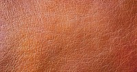 Leather texture, brown background, clothing material 