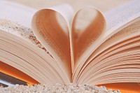 Free open book with heart shaped pages photo, public domain book CC0 image.