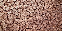 Cracked ground texture background for Facebook cover and social media banner