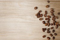 Coffee beans border, wooden background psd