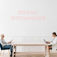 Couple sitting with a social distancing in a house mockup