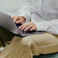 Woman working from home on her laptop