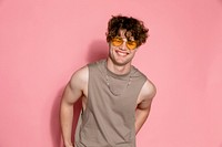 Curly hair man on pink background