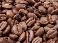 Roasted coffee beans background. Original public domain image from Wikimedia Commons