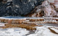 Terrace of travertine at Mammoth Hot Springs in Yellowstone National Park in Wyoming, USA. Original public domain image from Wikimedia Commons