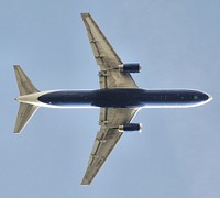 British Airways Boeing 767-300 (G-BNWA) takes off (over my head) from London Heathrow Airport, England. The undercarriages have retracted. Original public domain image from Wikimedia Commons