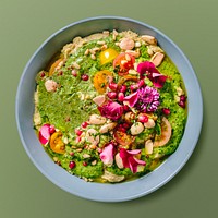 Mediterranean sauce bowl on green background, food photography