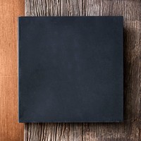 Black frame on wooden background vector