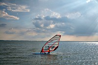 Windsurfer in Indian River Bay between Dewey Beach and Bethany Beach, Delaware.