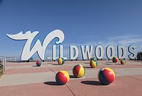 Welcome sign and concrete beach balls on the boardwalk in Wildwood, New Jersey