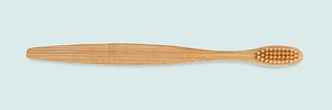 Natural bamboo toothbrush on blue background banner