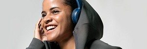 Sporty woman listening to music email header banner