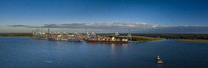(Panorama made from multiple photographs shot in sequence) Two container ships docked at the Wando Welch Terminal (WWT) in Mount Pleasant, South Carolina, on November 19, 2020.