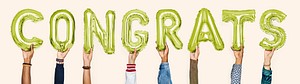 Green alphabet balloons forming the word congrats
