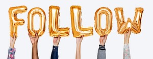 Hands showing follow balloons word