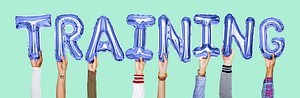 Hands holding training word in balloon letters