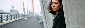 Asian woman in the city social banner