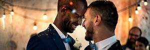 Gay couple dancing on their wedding day