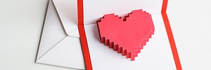 Pixelated heart in an envelope