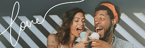 Cheerful couple enjoying an ice cream