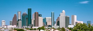 Downtown Houston skyline. Original public domain image from <a href="https://commons.wikimedia.org/wiki/File:Buildings-city-houston-skyline-1870617.jpg" target="_blank" rel="noopener noreferrer nofollow">Wikimedia Commons</a>