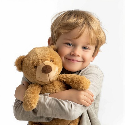 Child hugging teddy bear