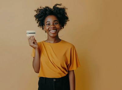 Smiling woman holding credit card