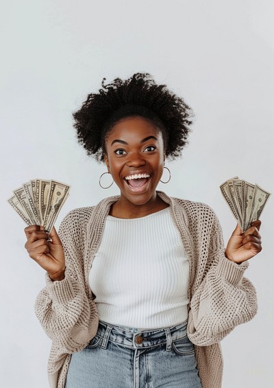 Woman holding money happy background clothing.