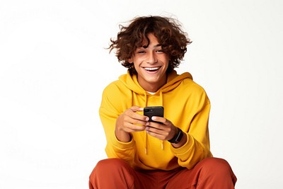 Smiling teenager holding smartphone