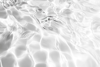 Water waves white furniture outdoors.