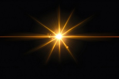 An isolated gold blink sun ray light effect flare background outdoors.